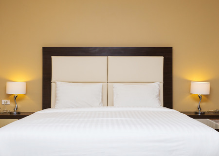 bedroom with bed and lamp decorationの写真素材