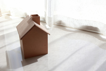 small wooden house in the morning with white curtainの写真素材