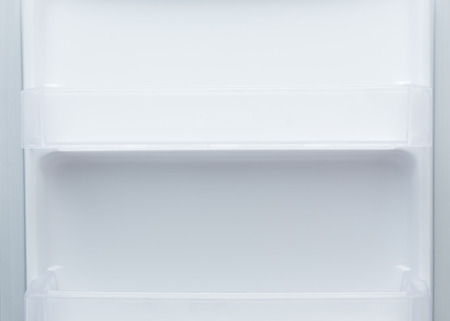 empty refrigerator freezer of kitchen applianceの写真素材