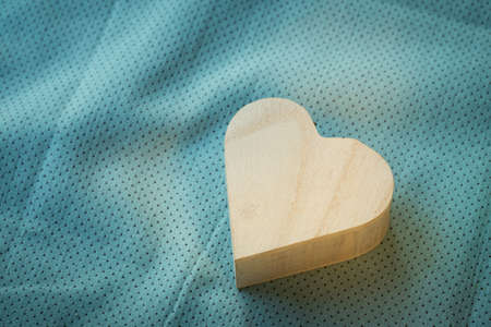 heart  wooden box on cloth fabric backgroundの写真素材