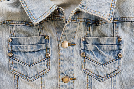 jean shirt with pocket and metal button on clothing textile industrial