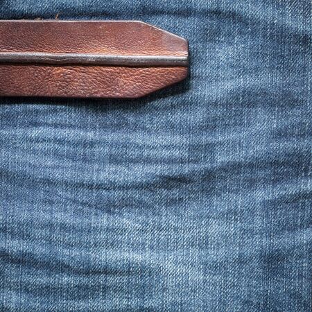denim jean texture background with leather belt