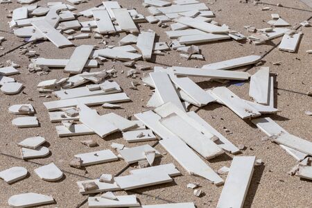 pile of broken damaged wood plankの写真素材