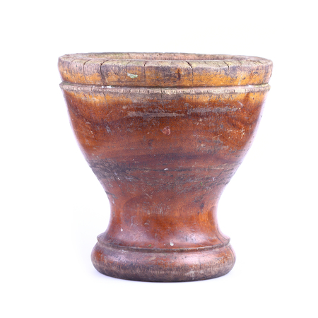 wooden mortar isolated on white backgroundの写真素材