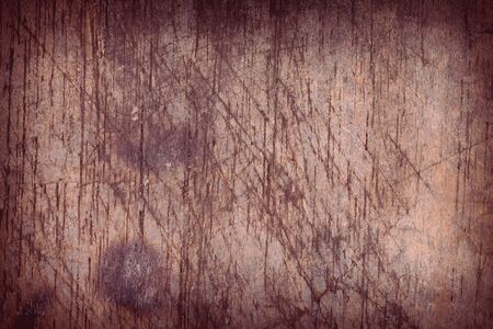 wood board weathered with scratch texture backgroundの写真素材