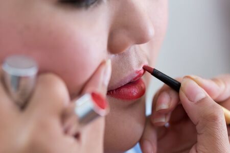 red lipstick of makeup with cosmetic for womanの写真素材