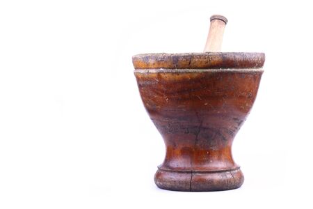 wooden mortar and pestle isolated on white backgroundの写真素材