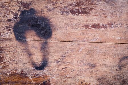 wood board weathered with scratch texture backgroundの写真素材