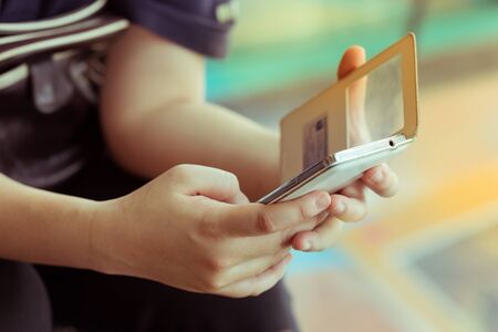 women lifestyle using a mobile phone with texting message on app smartphone playing social network and shopping onlineの写真素材