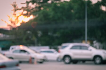 car driving on road with traffic jam in the city, abstract blurred backgroundの写真素材