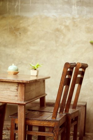 set of wooden table and chair decorated in garden, interior of cafe coffee shop with naturalの写真素材