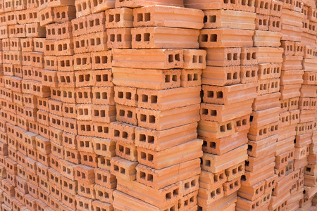 pile of brick block used for industrial in residential building construction site, image for...