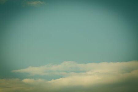vintage sky weather background with white cloudsの写真素材