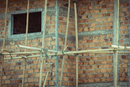 construction house structure made from cement and brick, image used retro filterの写真素材