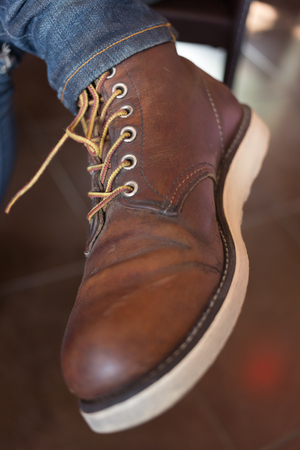 old brown boot leather shoes, close-up imageの写真素材