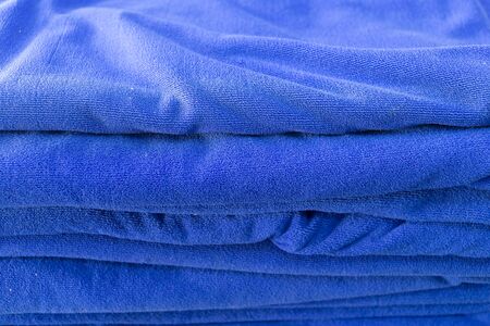 blue towel softness fluffy fiber fabric of textile fabric industrialの写真素材