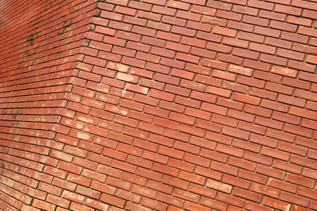 brick wall texture background material of industry building constructionの写真素材