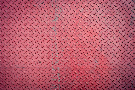 red dirty metal plate, metallic grunge texture backgroundの写真素材