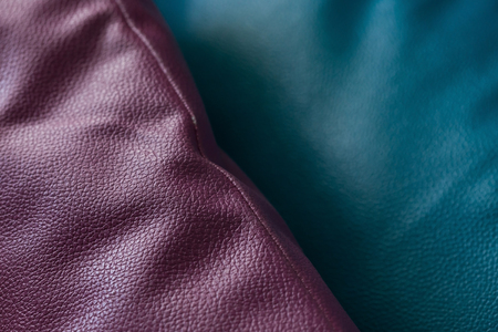 leatherette of pillow decorated on sofa furniture, close up imageの写真素材