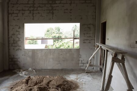 pile sand in construction site prepared mix cement concrete for plaster wall and floorの写真素材