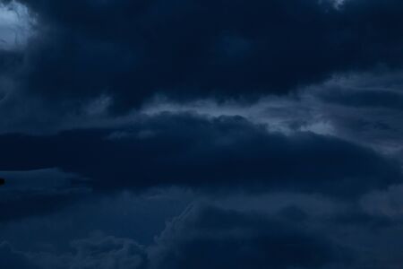 black cloud in dark night sky used for halloween backgroundの写真素材