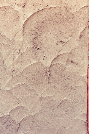 plaster mortar wall of industrial building construction, rough cement wall texture background, image used filter vintageの写真素材
