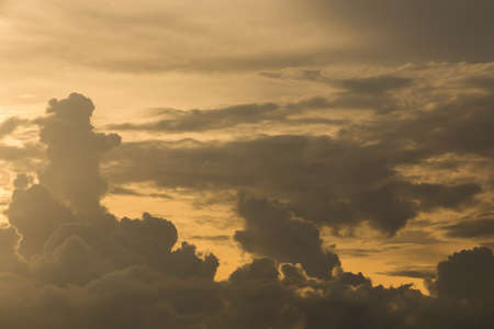 beautiful sunset sky, golden light of sun on dramatic moody sky