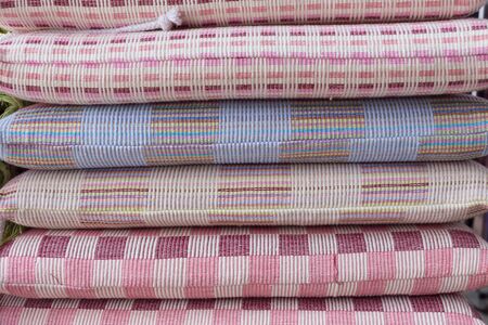 heap of cloth fabric in retail shop