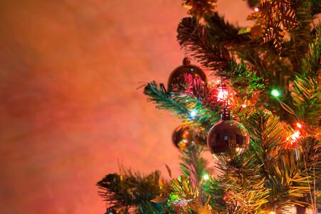 christmas background, christmas tree decorated with twinkling light and christmas ornament in homeの写真素材