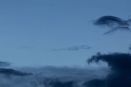 black cloud in dark night sky used for halloween backgroundの写真素材