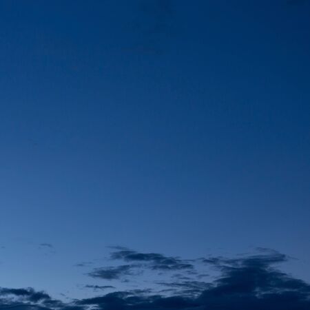 black cloud in dark night sky used for halloween backgroundの写真素材