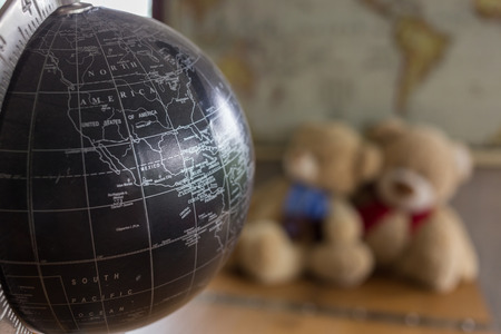 model of black world decorated in living room with furniture backgroundの写真素材