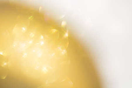 gold background, abstract golden bokeh light, happy new year celebration backgroundの写真素材