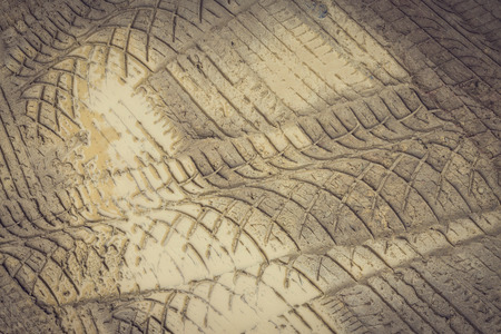 wheel trace off road on muddy soilの写真素材