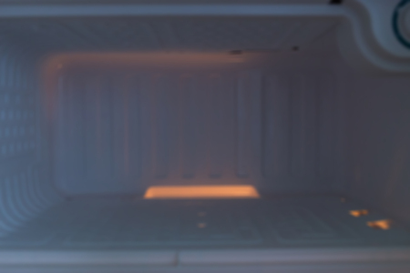 image blur background, empty refrigerator freezer of kitchen applianceの写真素材