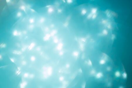 abstract blue and white background, image blur bokeh light celebrationの写真素材