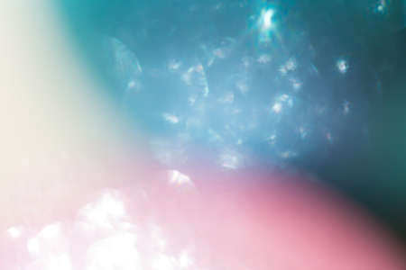 abstract pink and blue bokeh light celebration, love romantic backgroundの写真素材