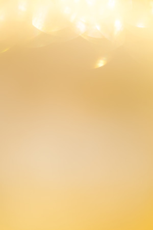 gold background, abstract golden bokeh light celebration backgroundの写真素材