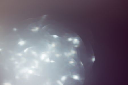 abstract bokeh light celebration background, image defocused light shining twinkle backgroundの写真素材