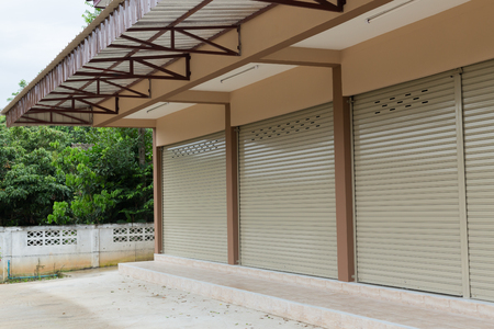 roller shutter door in warehouse building, aluminium steel metal doorの写真素材