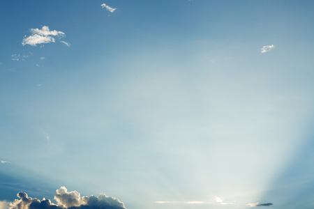 light rays on clear blue sky backgroundの写真素材