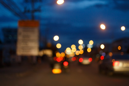 night light of traffic car on the city street, abstract blur bokeh backgroundの写真素材