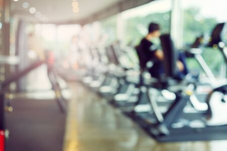 blurred fitness gym exercise workout sport club center with healthy lifestyle for banner advertising backgroundの写真素材