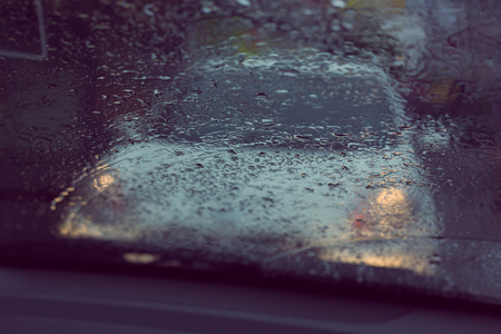 accident car crash traffic road in rainy night, abstract blur image backgroundの写真素材