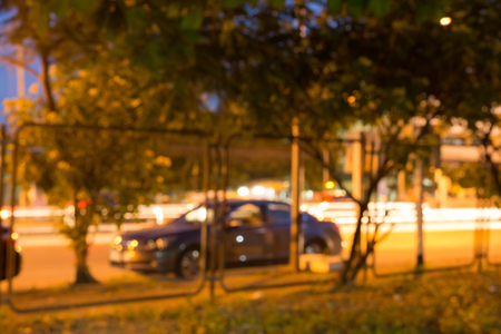 night light of roadside traffic in the city street, abstract blur bokeh backgroundの写真素材