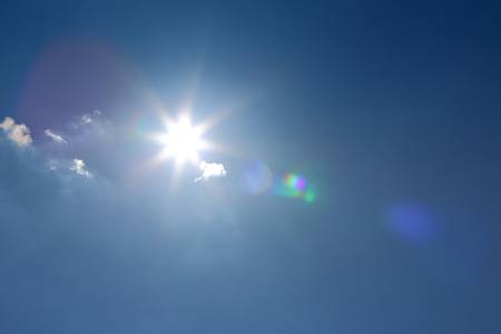 sun on clear blue sky weather background, light rays solar of clean energy power