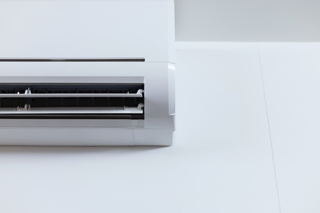 air conditioner cooling fresh system saving energy on white wall backgroundの写真素材