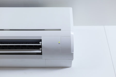 air conditioner cooling fresh system saving energy on white wall backgroundの写真素材