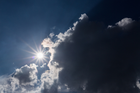 sun light on dramatic moody sky cloudy dayの写真素材