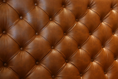 abstract luxury brown leather texture sofa furniture upholstery or wall interior decoration backgroundの写真素材